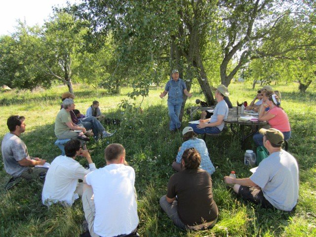 Permaculture class in the orchard - Bill Wilson teaching