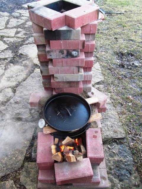 That is just steam in the picture. Most of the time there was no smoke from the rocket stove.
