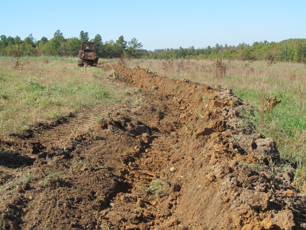 This is following the third pass. Throw in some clover seed and by spring it will be a green & lush swale.
